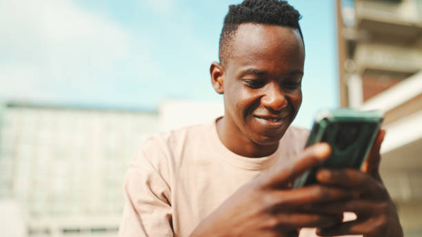 A young person using a phone